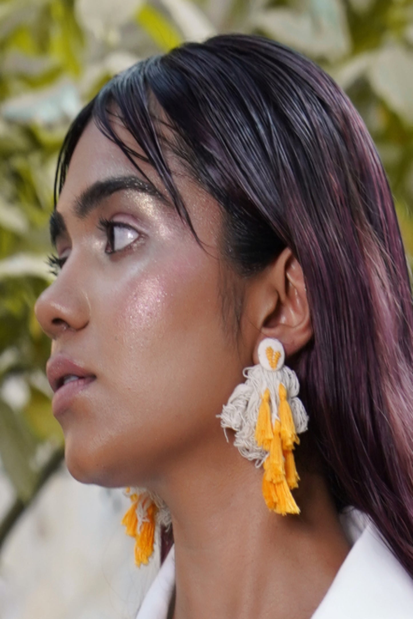 Orange tassel heart earring
